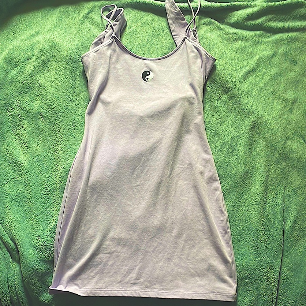SO small mini dress, lavender color, with a yin and Yang symbol on the front.